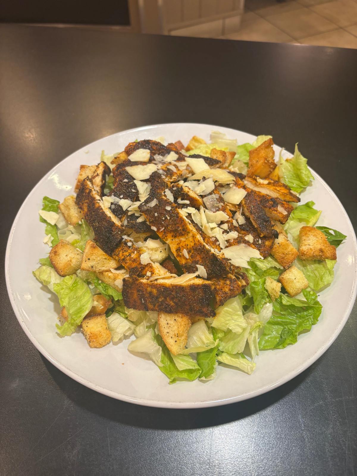 Fresh Caesar salad with croutons and parmesan