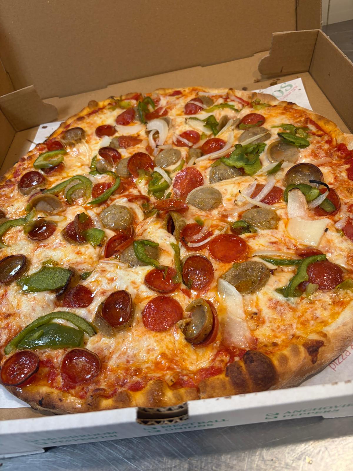 Dino's famous sweet sauce pizza with a unique tangy-sweet tomato blend